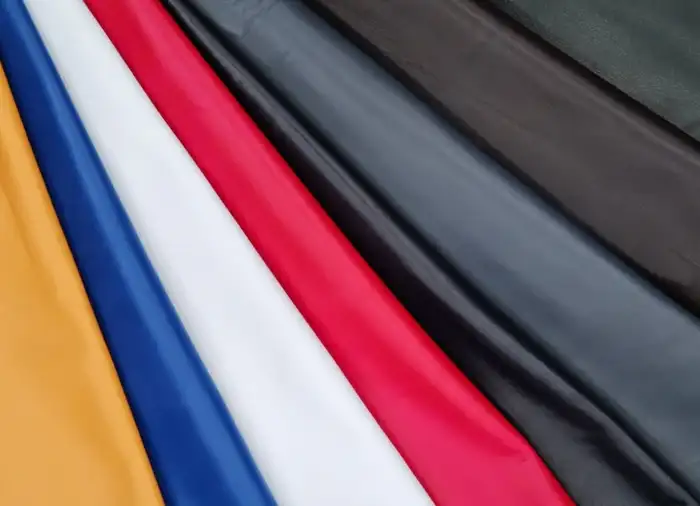 Team working on premium leather jackets manufacturing at S. Behram Leather factory