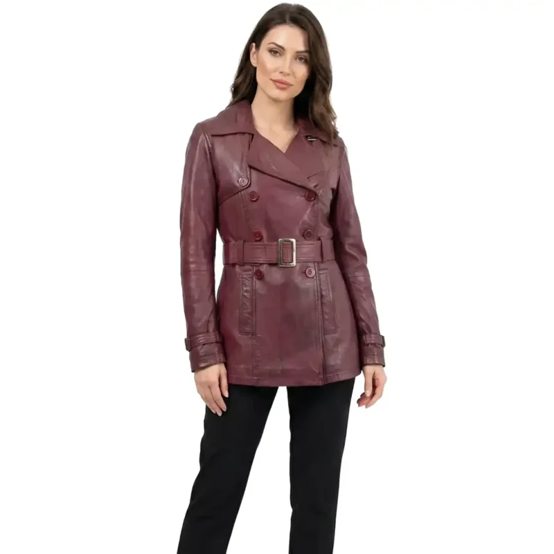 Arctic Grace Leather Trench | Women's Burgundy Leather Trench Jacket Double Breasted Belted Coat Woman wearing burgundy leather trench jacket with double breasted buttons belt and notch lapels on white background