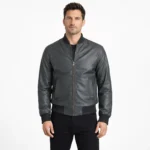 Man wearing gray leather bomber jacket with ribbed collar cuffs and hem front zipper closure on white background