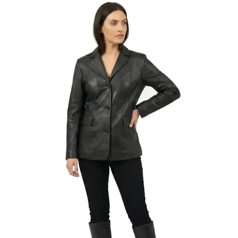 Woman wearing black leather tailored blazer with button closure, structured fit, and classic lapel front view of Atelier Noir Signature Blazer