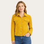Women's vibrant mustard yellow suede leather jacket with classic collar, silver snap buttons, chest pockets, and cropped trucker style - front view