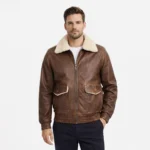 Front view of men's brown leather aviator jacket with cream shearling collar, central zipper, dual flap chest pockets with shearling trim, elasticated cuffs and hem