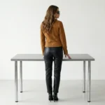 Back view of camel suede leather biker jacket for women showing clean tailored back and slim silhouette