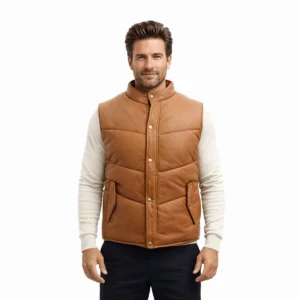 Men's tan cognac leather puffer vest with stand collar, snap button closure, horizontal quilted panels, and side pockets - front view of Cognac Puffer Leather Vest
