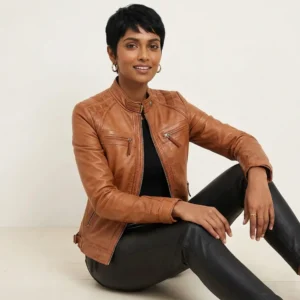 Woman wearing cognac brown leather quilted racer jacket with black outfit front view of Cognac Racer Quilted Jacket