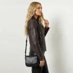 Side view of women’s genuine leather jacket showing slim fit and zip details