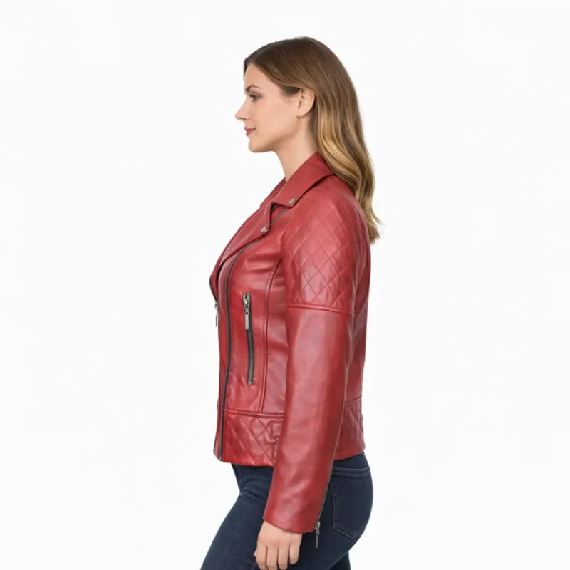 Side profile of red leather motorcycle jacket showing quilted sleeve pattern, fitted waist, and structured shoulder design