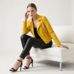 Women's vibrant yellow leather moto jacket with wide notched lapels, asymmetric zipper closure, diagonal zipper pockets, and fitted silhouette - front view of Golden Hour Racer Leather Jacket