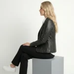 Side view of women’s black tailored leather blazer showing contoured fit and structured blazer cut of Luxe Sovereign Leather Blazer