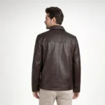 Rear view of dark brown leather jacket showing clean back panel, horizontal seaming, hip-length cut, minimalist construction - Mocha Classic Leather Jacket