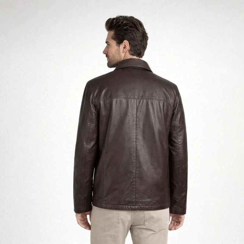 Rear view of dark brown leather jacket showing clean back panel, horizontal seaming, hip-length cut, minimalist construction - Mocha Classic Leather Jacket