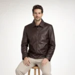 Side profile of dark brown leather jacket showing shirt collar, horizontal chest seam, straight silhouette, hip-length cut - Mocha Classic Leather Jacket