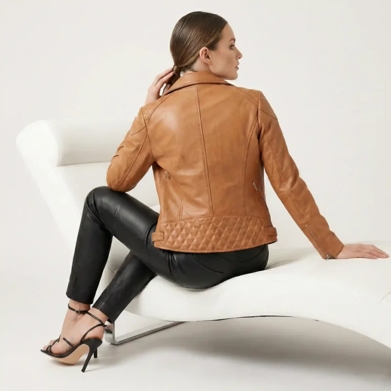Side profile of tan cognac leather moto jacket showing wide lapels, asymmetric zipper, fitted waist, and sleek silhouette - Noir Prestige Slim-Fit Leather Jacket