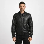 Men's sleek black leather bomber jacket with ribbed collar, front zipper closure, side zipper pockets, and ribbed cuffs and waistband - front view