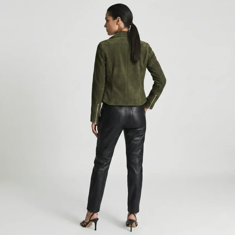 Rear view of olive green suede motorcycle jacket showing smooth back panel, fitted waist, structured shoulders, and hip-length cut