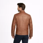 Back view of tan brown leather jacket showing center back seam clean panels and fitted moto style cut - Saddle Ridge Jacket
