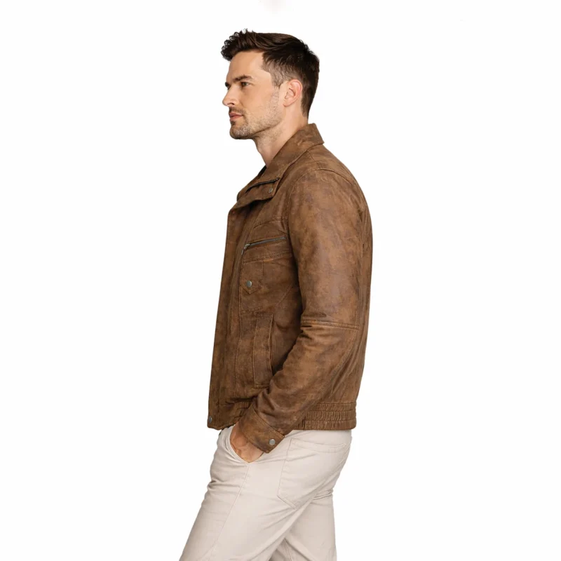 Side profile of brown distressed suede bomber jacket showing relaxed fit, stand collar, weathered finish, and classic bomber silhouette - Terra Imperium Bomber Jacket