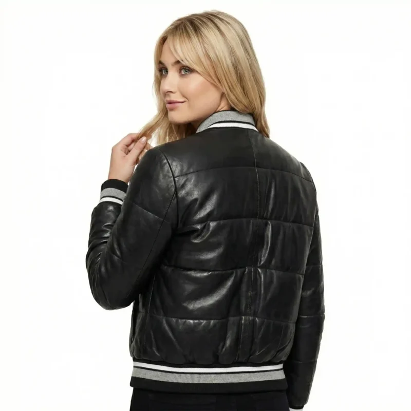 Black leather bomber jacket back view showing paneled construction and ribbed waistband - Valencia Supreme Leather Bomber
