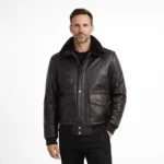 Front view of men's black leather aviator jacket with brown fur collar, snap button closure, dual flap chest pockets, shoulder epaulets, ribbed cuffs and hem