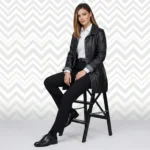 Front view of women’s black tailored leather blazer coat with button closure and structured lapel